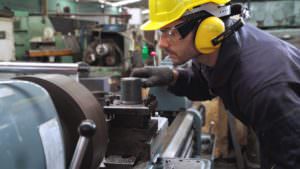 industrial worker battling heat stress in a hot factory